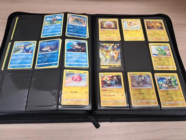 An open trade binder filled with Pokémon cards, ready for trading